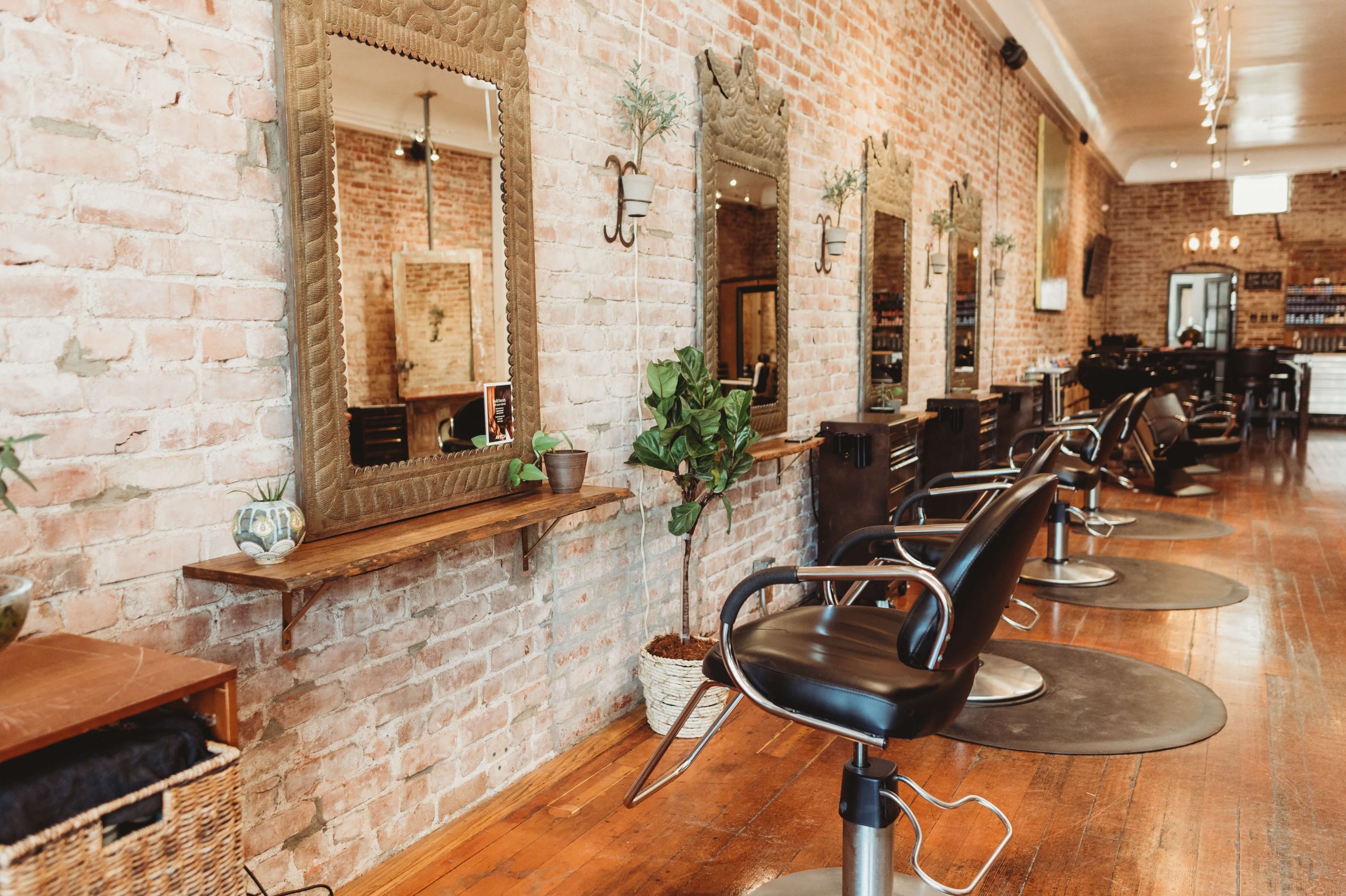 Natural light and brick at Nimbus Salon, a hair salon in Los Gatos
